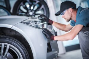 preparing a plastic car bumper for professional refinishing